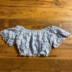 Blue lacey cropped shirt with flowy arm holes